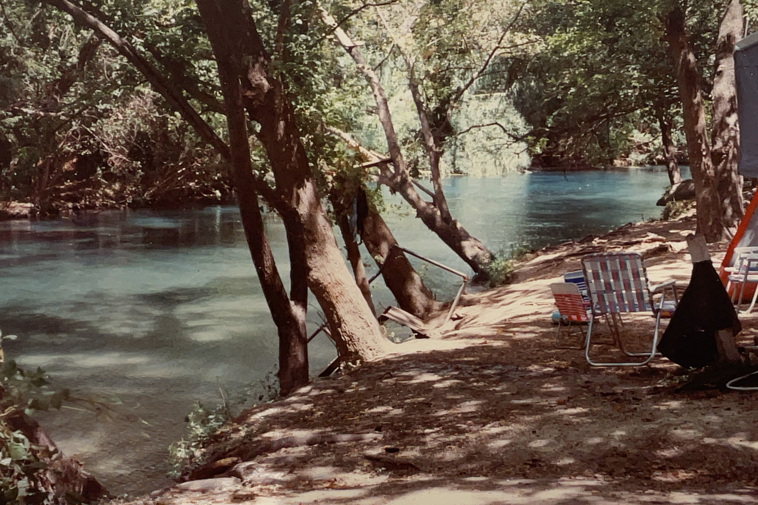 Historic 1980s photograph of the crystal clear spring-fed Comal River at Landa RV Park in New Braunfels Texas