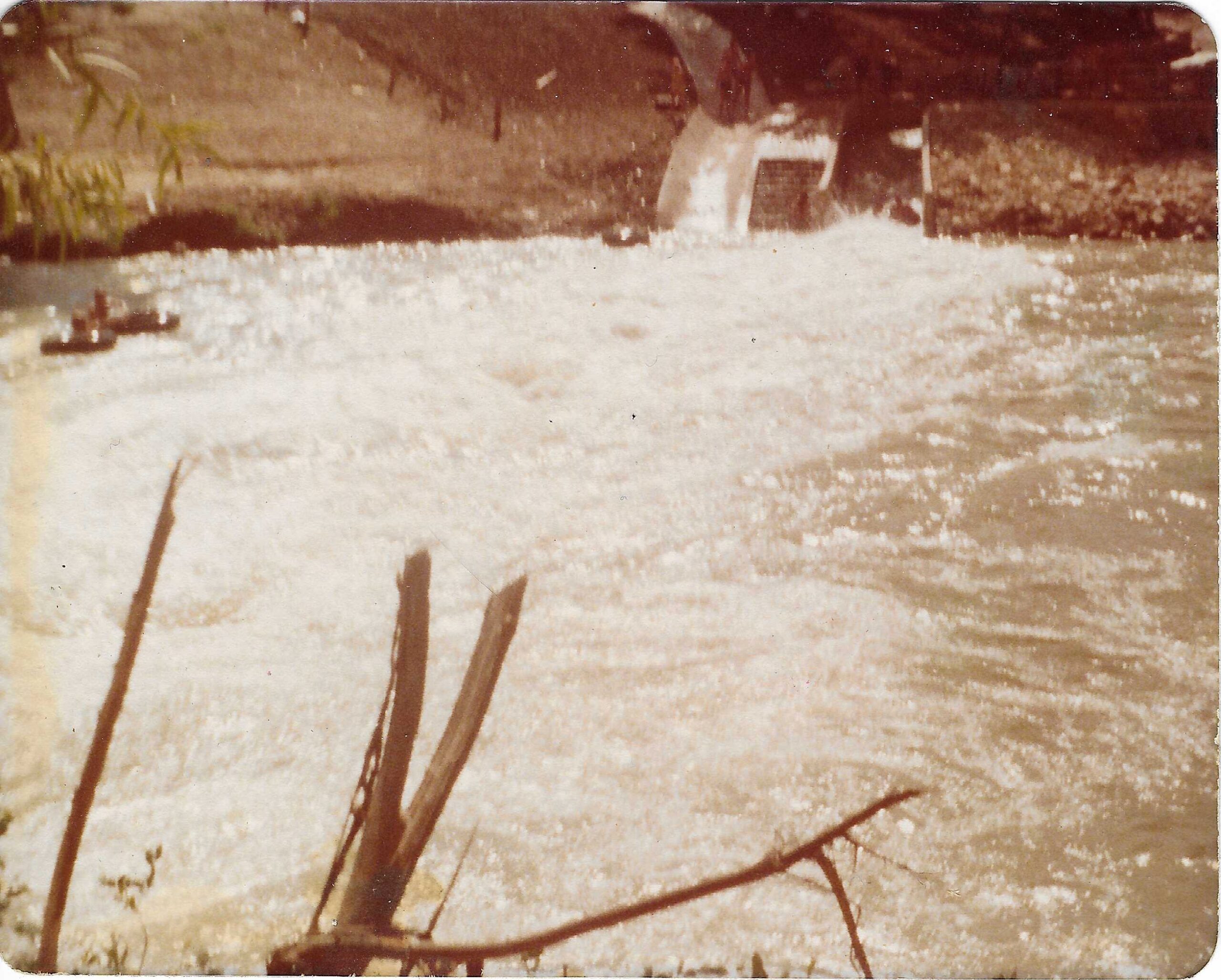Historical 1977 photograph of the entrance to the Comal River Tube Chute in New Braunfels Texas one year after opening