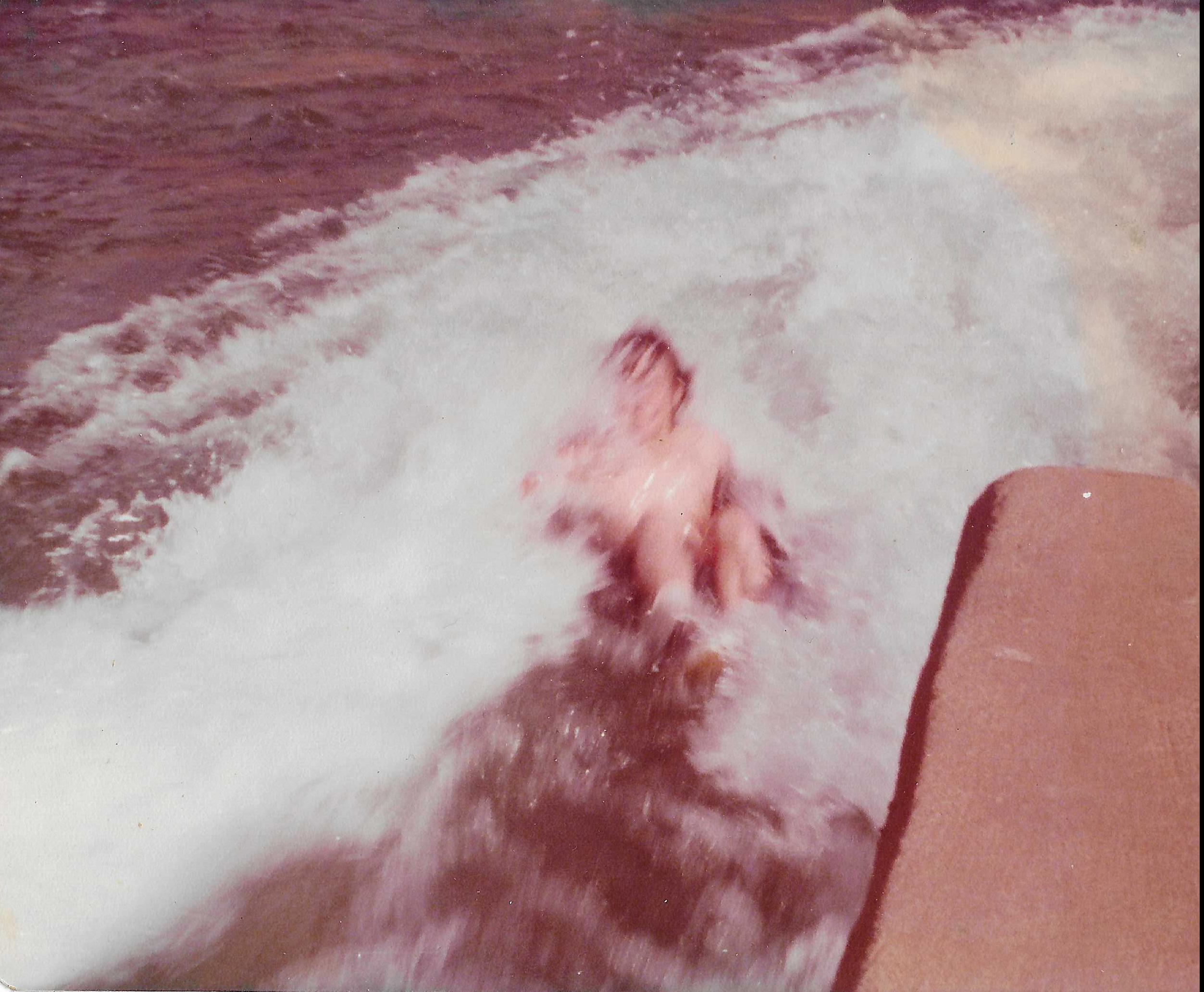 Historical 1977 close up photograph of tubers exiting the Comal River Tube Chute in New Braunfels Texas